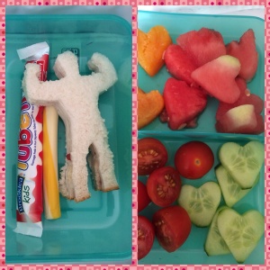 'I love daddy' - heart shaped watermelon, apricot and cucumber with some tomatoes, a yogurt and cheese